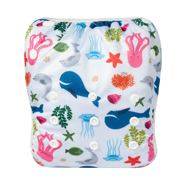 Reusable baby swim nappy by Arbora Casa, shown in a soft, waterproof fabric with adjustable snaps for a comfortable fit.