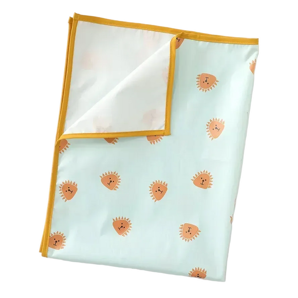 Reusable diaper changing pad by Arbora Casa with soft, waterproof surface and foldable design for easy changing on the go.