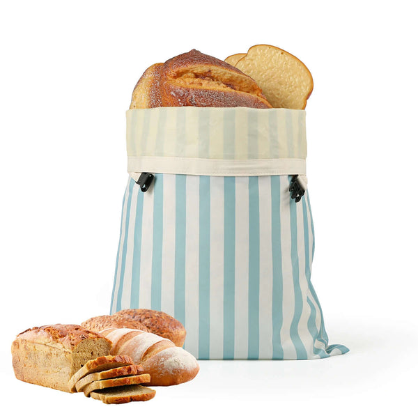Natural beeswax bread bag by Arbora Casa, showing the reusable cloth bag with beeswax coating for fresh bread storage.