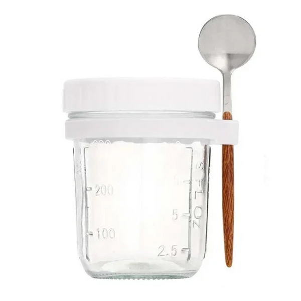 Clear glass salad storage container by Arbora Casa with airtight lid for fresh food storage.